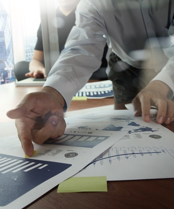 Double exposure of businessman hand working with new modern computer and business strategy as concept-270292-edited.jpeg