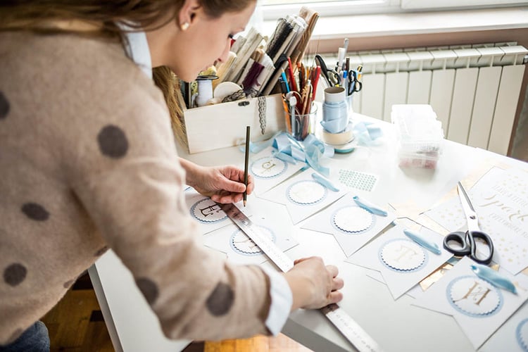 Artisan woman working with paper.jpg